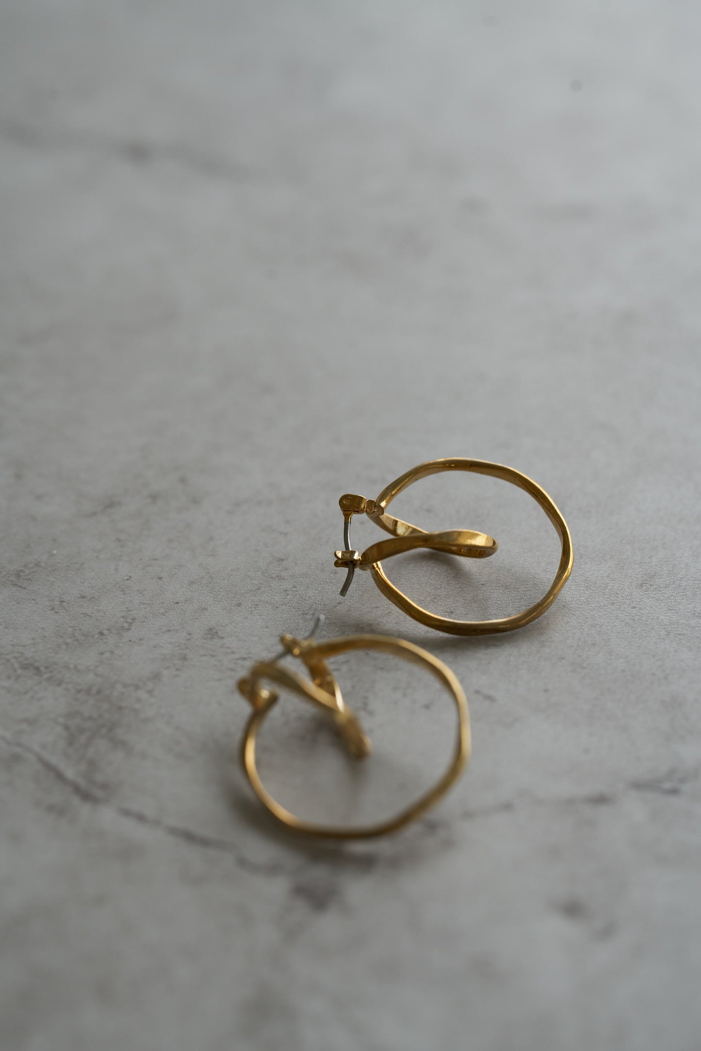 gold circle pierce