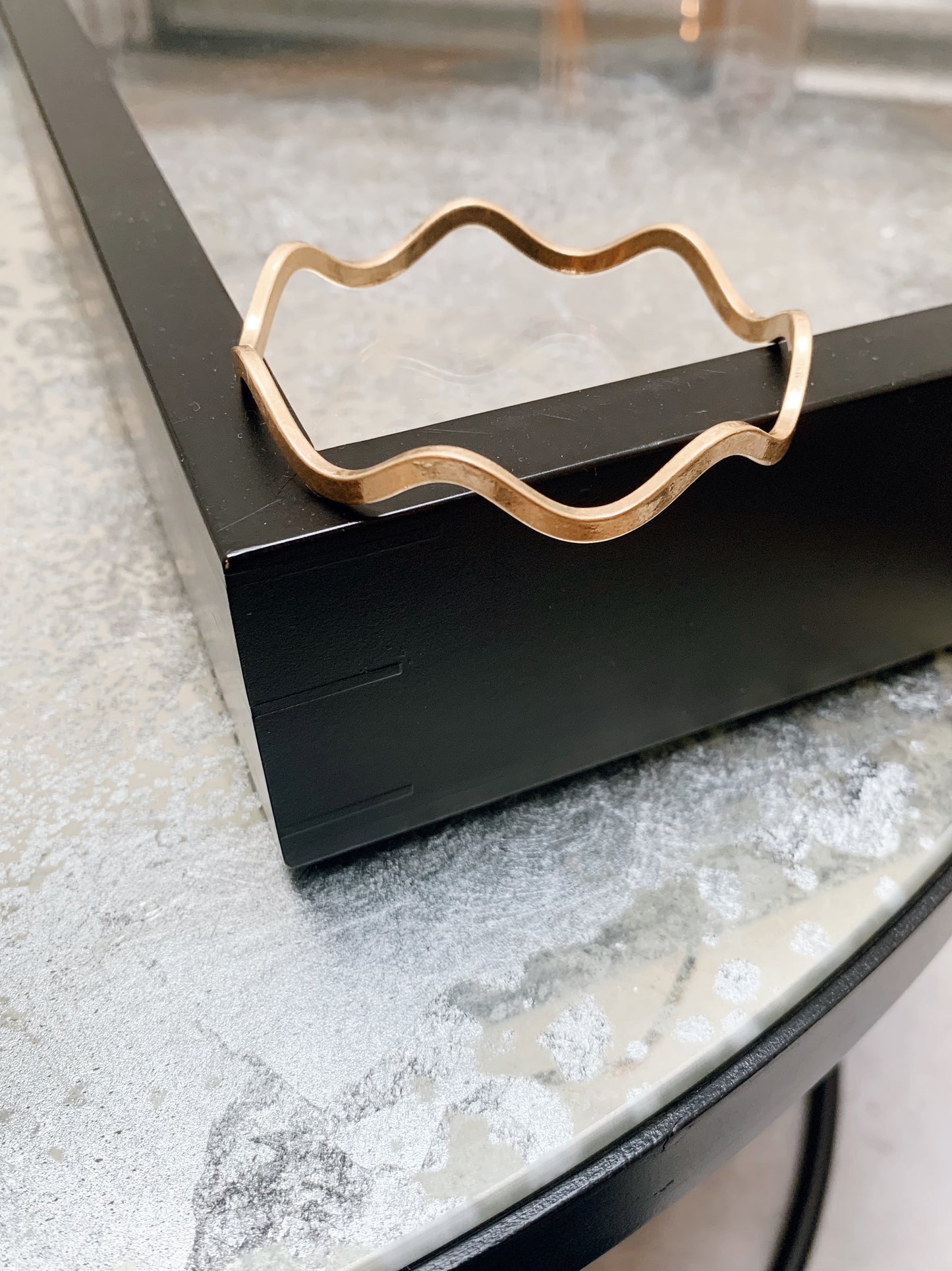 Wave design bangle.