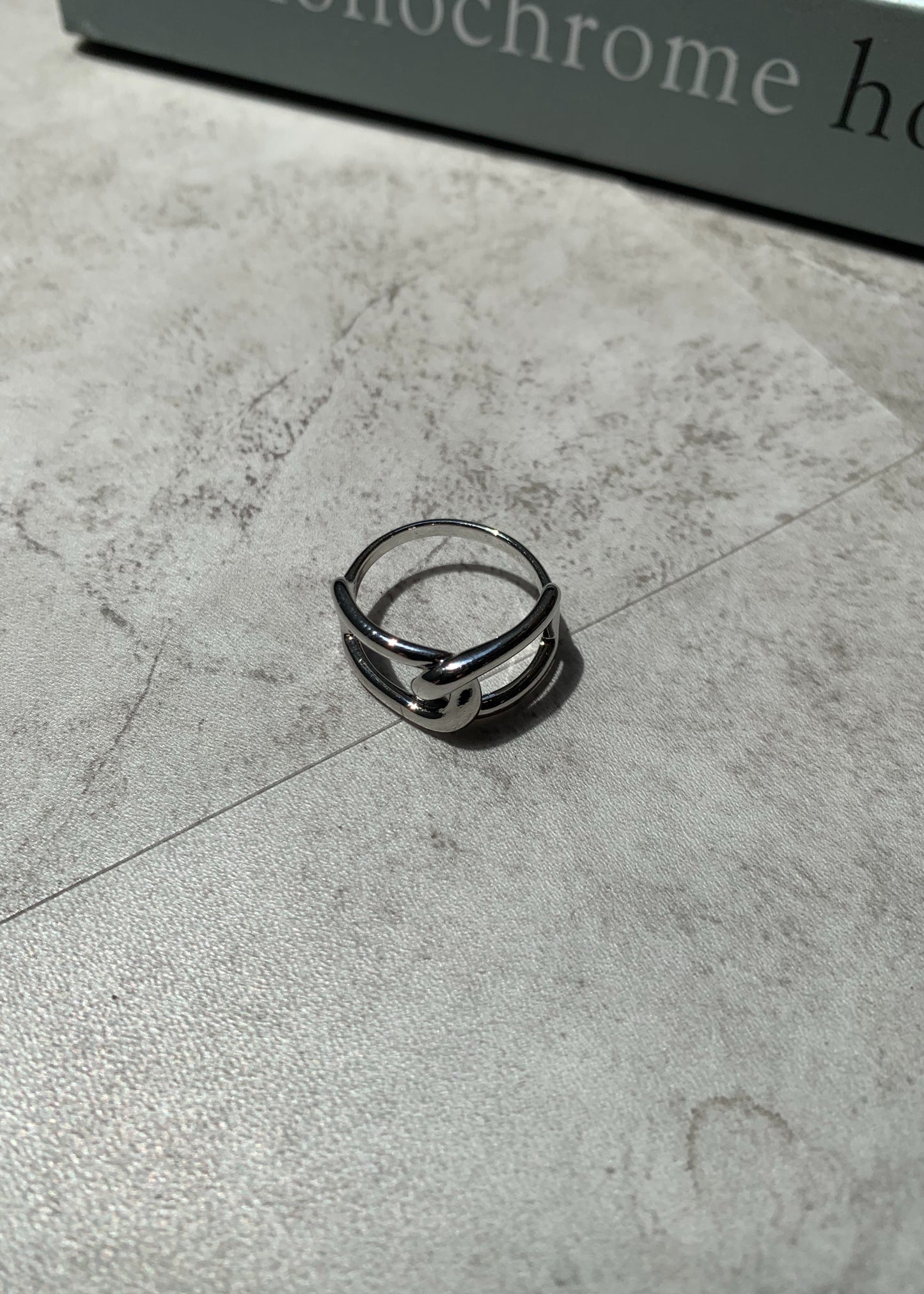 Cross design ring.