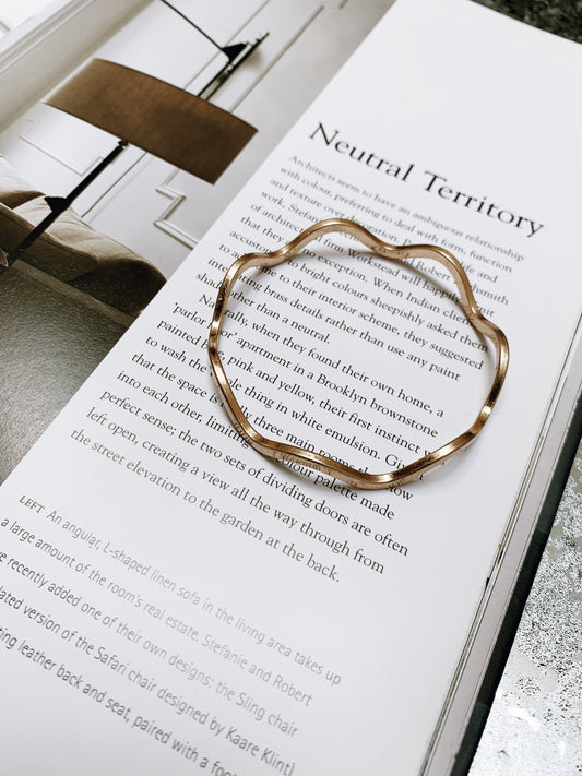 Wave design bangle.
