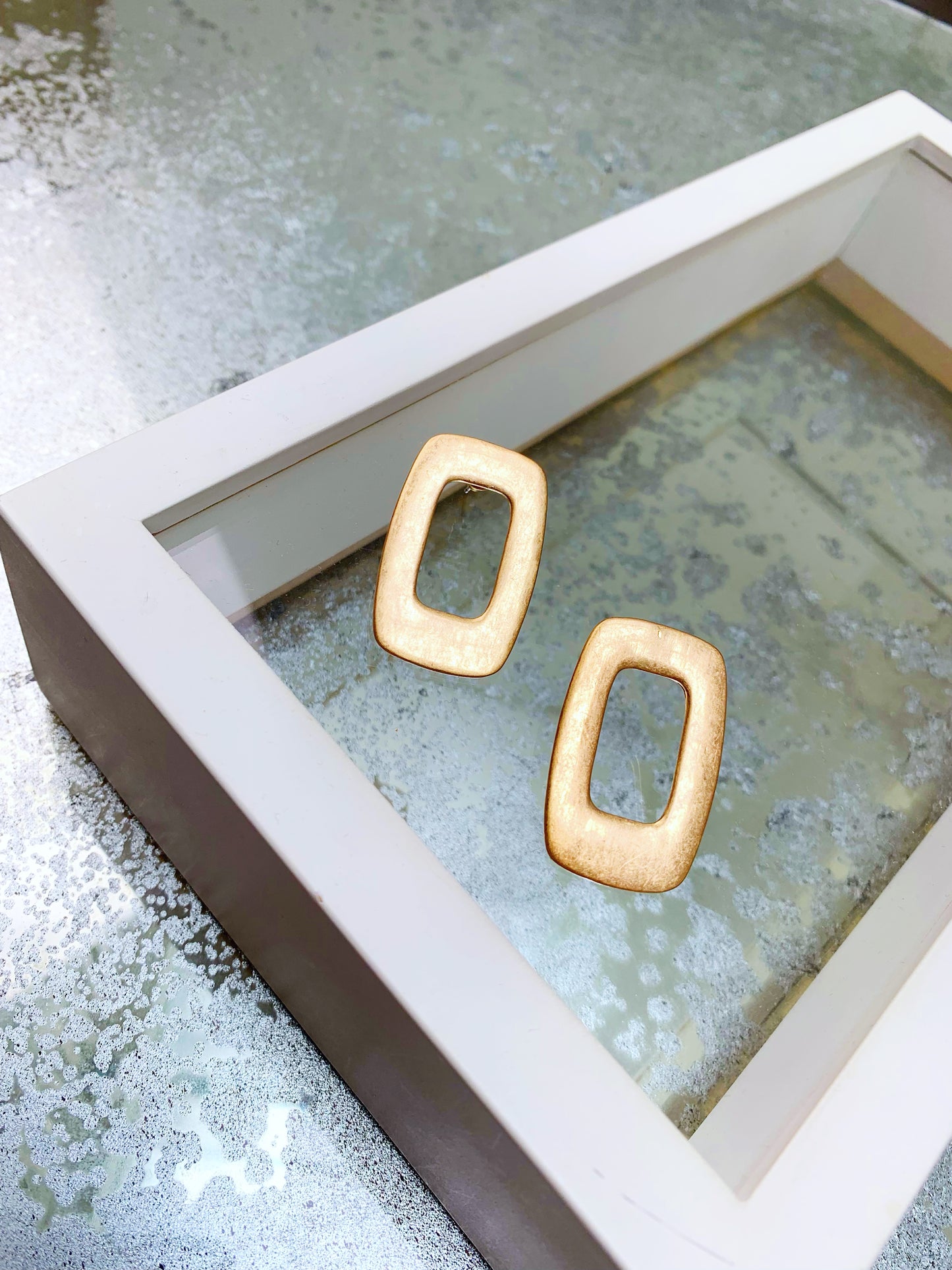 Square hoop pierce.
