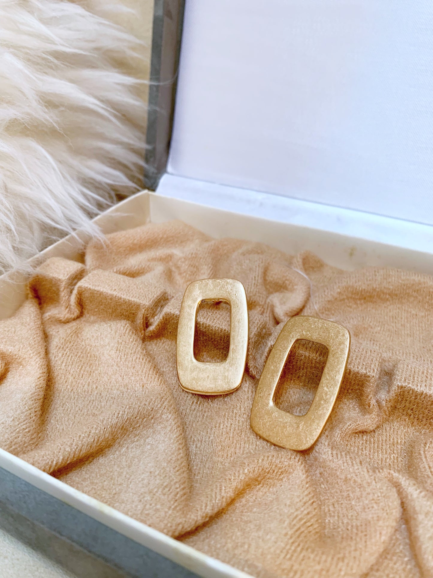 Square hoop pierce.