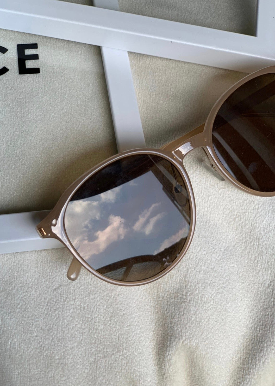 Beige color sunglasses