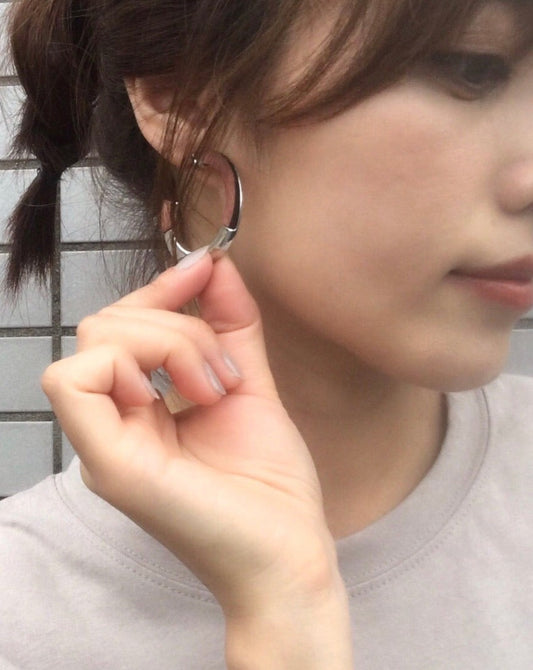Wood silver hoop pierce.