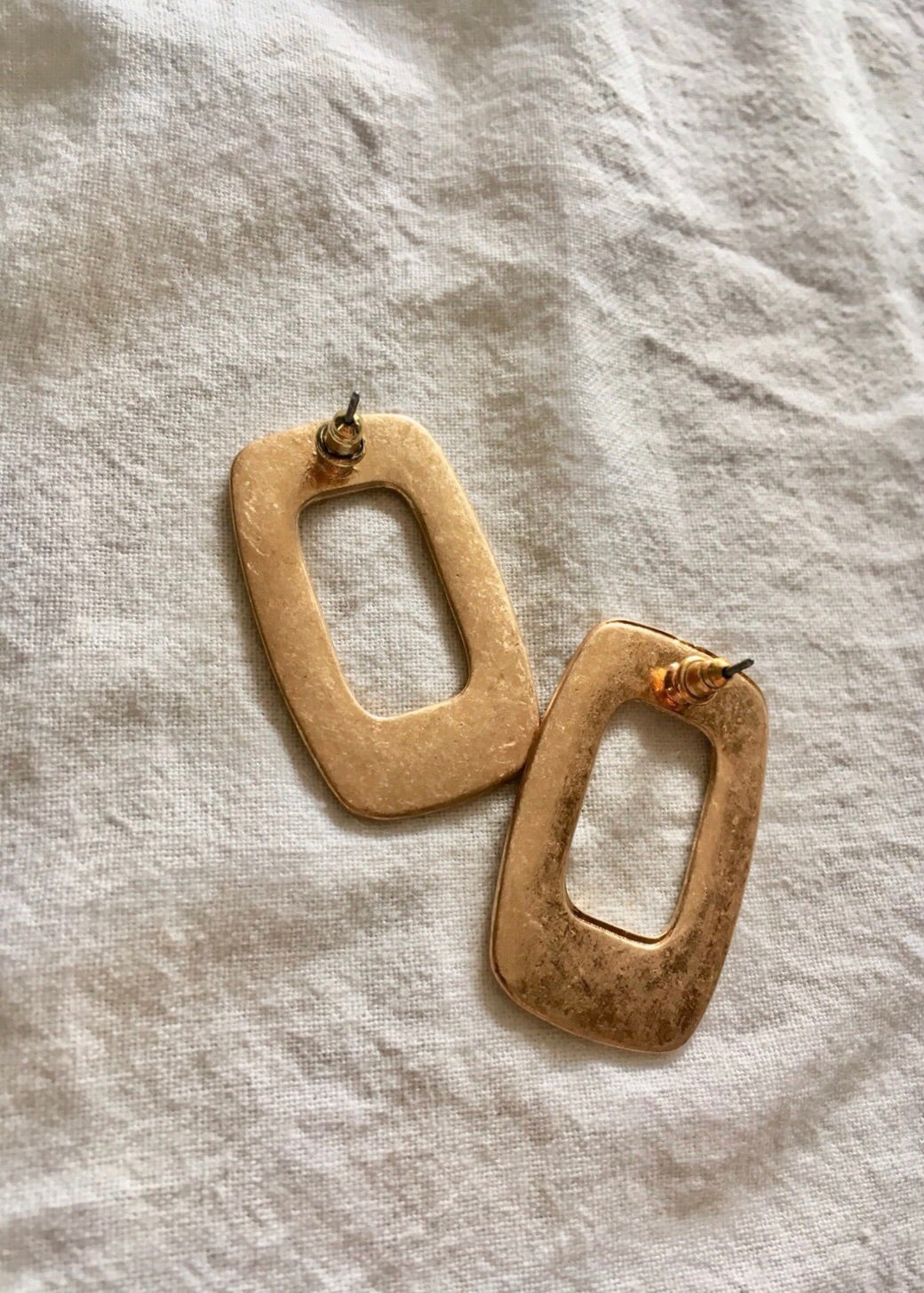 Square hoop pierce.